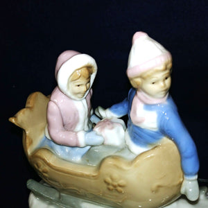 Meico Inc Figurine Collectible Porcelain Dog Pulling Sled with Children Vintage