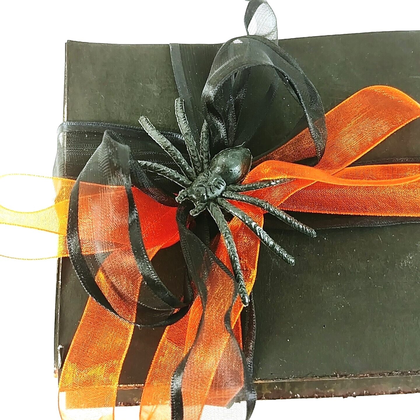 Halloween Book Stack Decor With Orange & Black Ribbons and a Spooky Spider