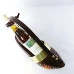 Load image into Gallery viewer, Wine Bottle Holder Hand Carved Wooden Shoe Rivet Accents
