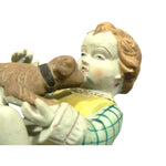 Load image into Gallery viewer, Bisque ceramic figurine matte finish hand painted sitting boy with dog Japan
