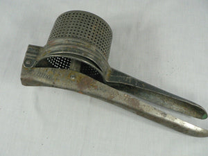 Vintage Primitive Potato Ricer, Juicer, Hand Press Masher, metal