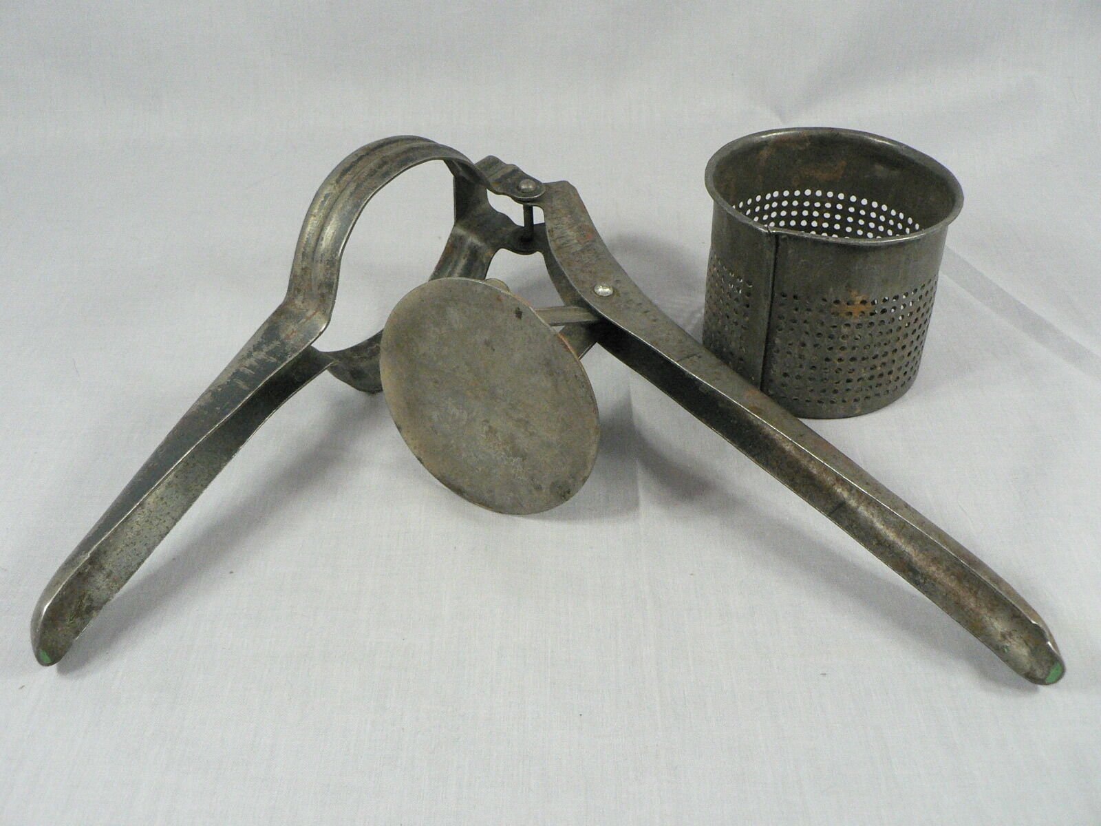 Vintage Primitive Potato Ricer, Juicer, Hand Press Masher, metal