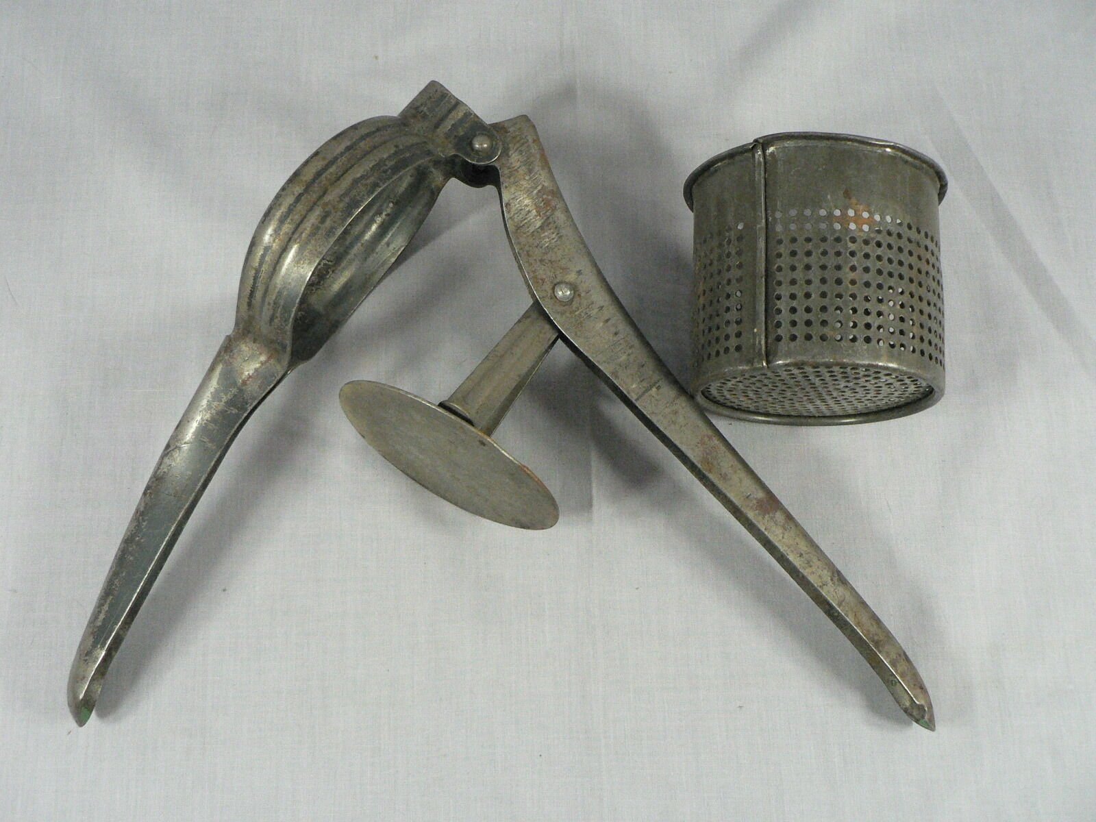 Vintage Primitive Potato Ricer, Juicer, Hand Press Masher, metal