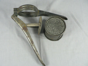 Vintage Primitive Potato Ricer, Juicer, Hand Press Masher, metal