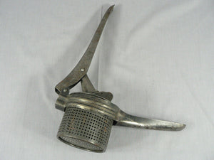 Vintage Primitive Potato Ricer, Juicer, Hand Press Masher, metal