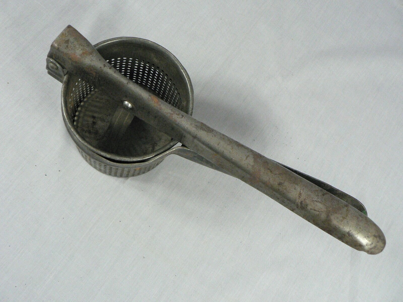 Vintage Primitive Potato Ricer, Juicer, Hand Press Masher, metal