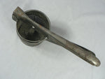 Load image into Gallery viewer, Vintage Primitive Potato Ricer, Juicer, Hand Press Masher, metal
