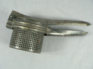 Vintage Primitive Potato Ricer, Juicer, Hand Press Masher, metal