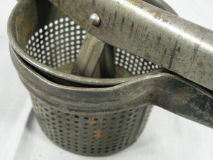 Vintage Primitive Potato Ricer, Juicer, Hand Press Masher, metal