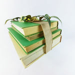 Load image into Gallery viewer, Book Stack Hardcover Ribbon Wrapped Floral Topped Reclaimed Books Set of 4
