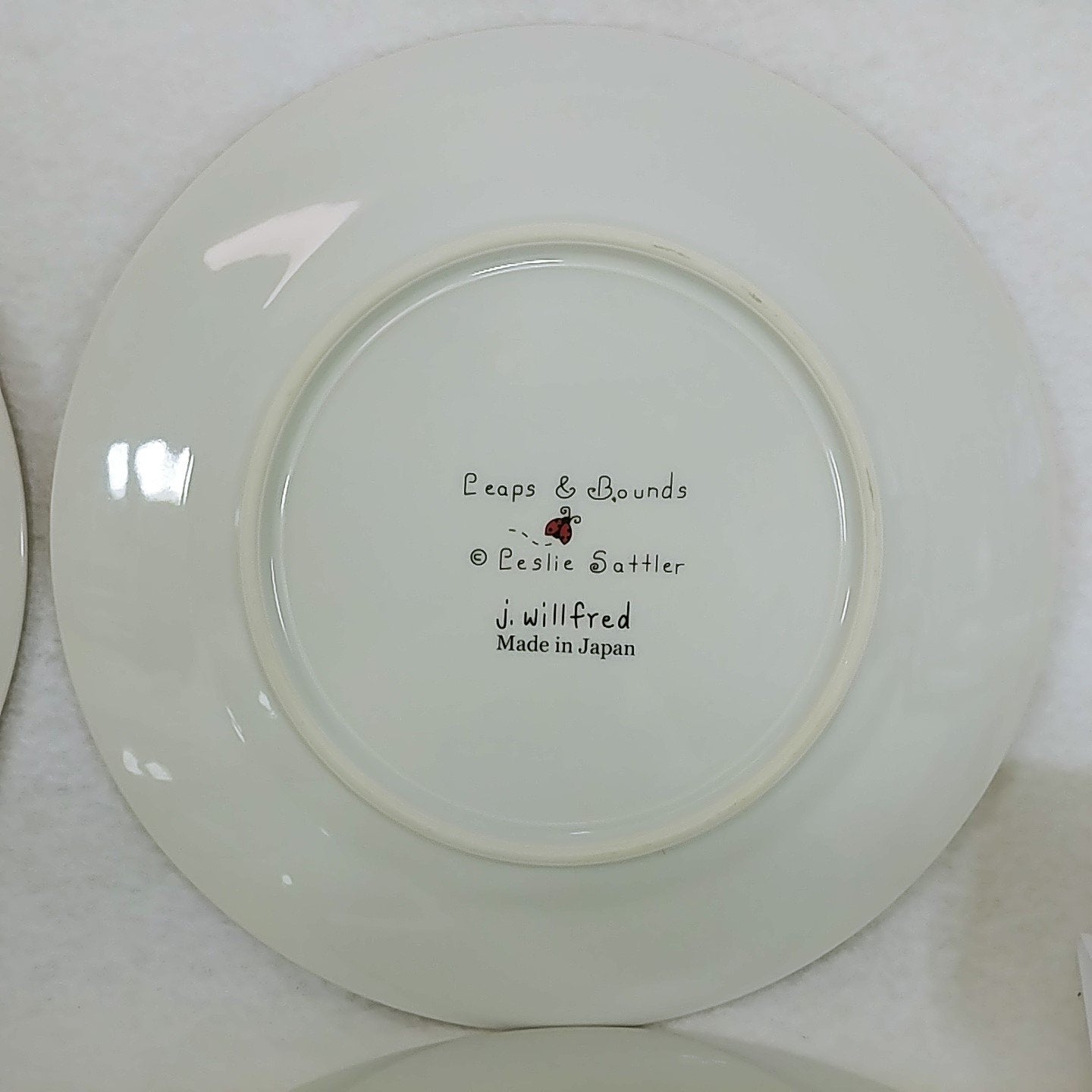 Dinner Plates Leaps & Bounds by Jay Willfred Dragonfly Artist Leslie Sattler