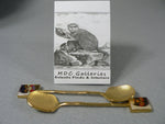 Load image into Gallery viewer, Collector Spoons Sugar Enameled African Mask Ends Gold Tone
