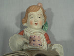 Load image into Gallery viewer, Bisque ceramic figurine matte finish hand painted girl reading a book Japan
