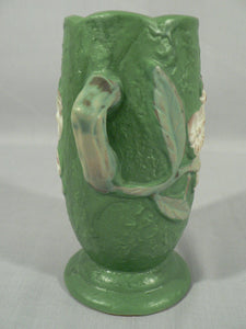 Decorative vase planter floral design staggered handles bottom stamped Roseville