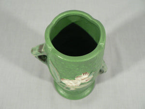 Decorative vase planter floral design staggered handles bottom stamped Roseville