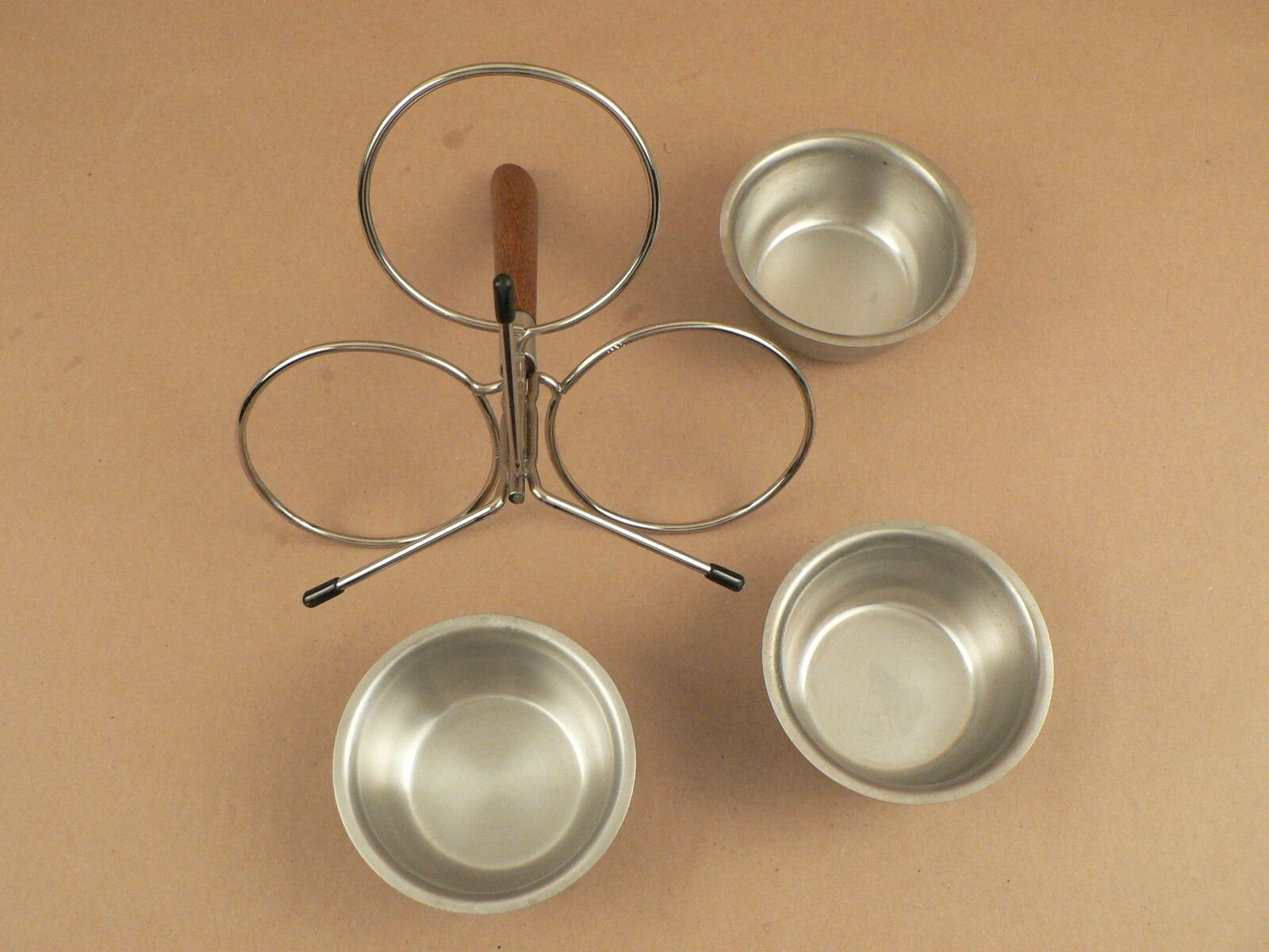 A Swedish modern retro condiment servers, 3 cups each, wood handle stand
