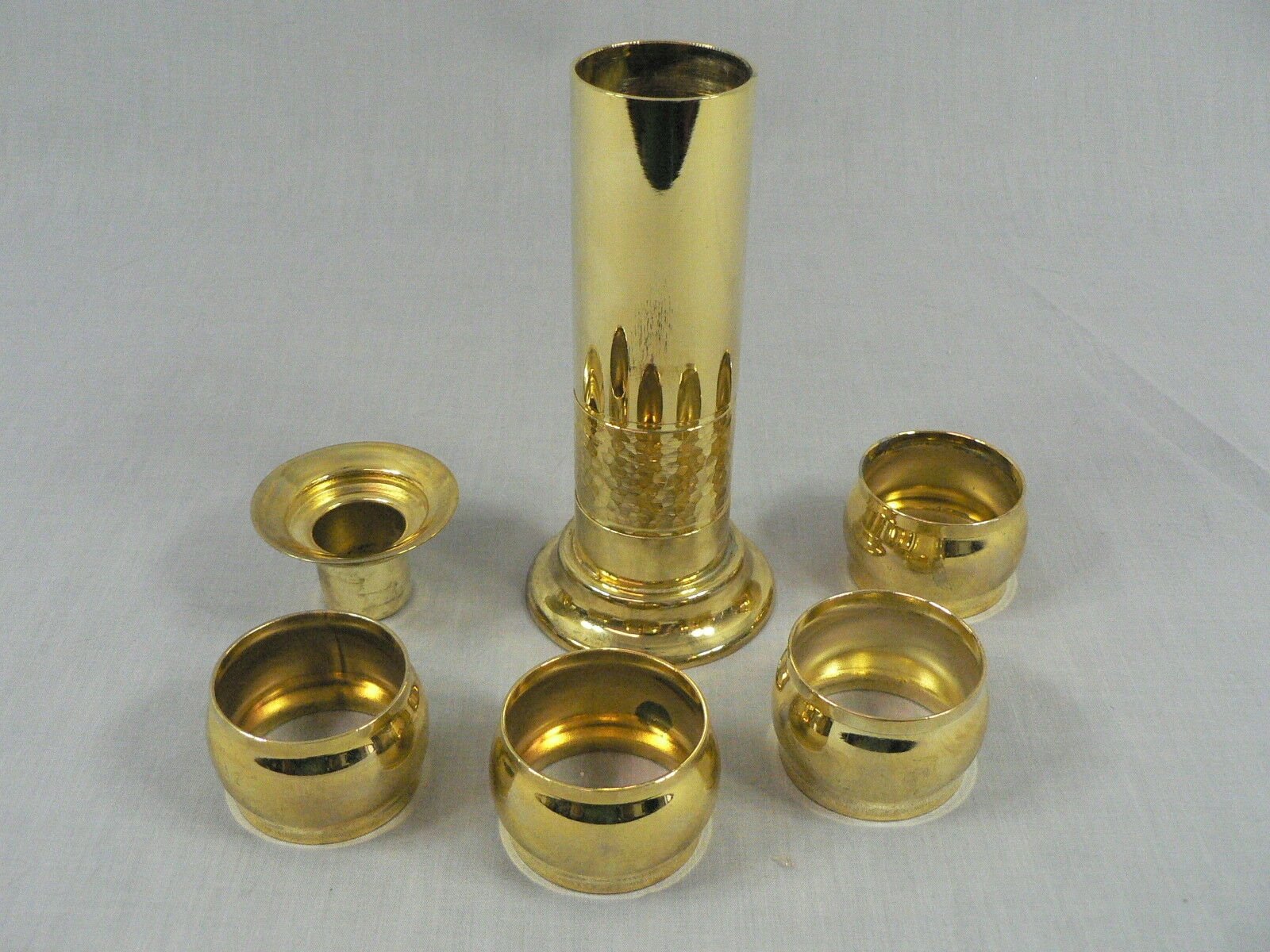 Napkin Rings, Stacked on Brass Candlestick Base 4 Rings and Stand