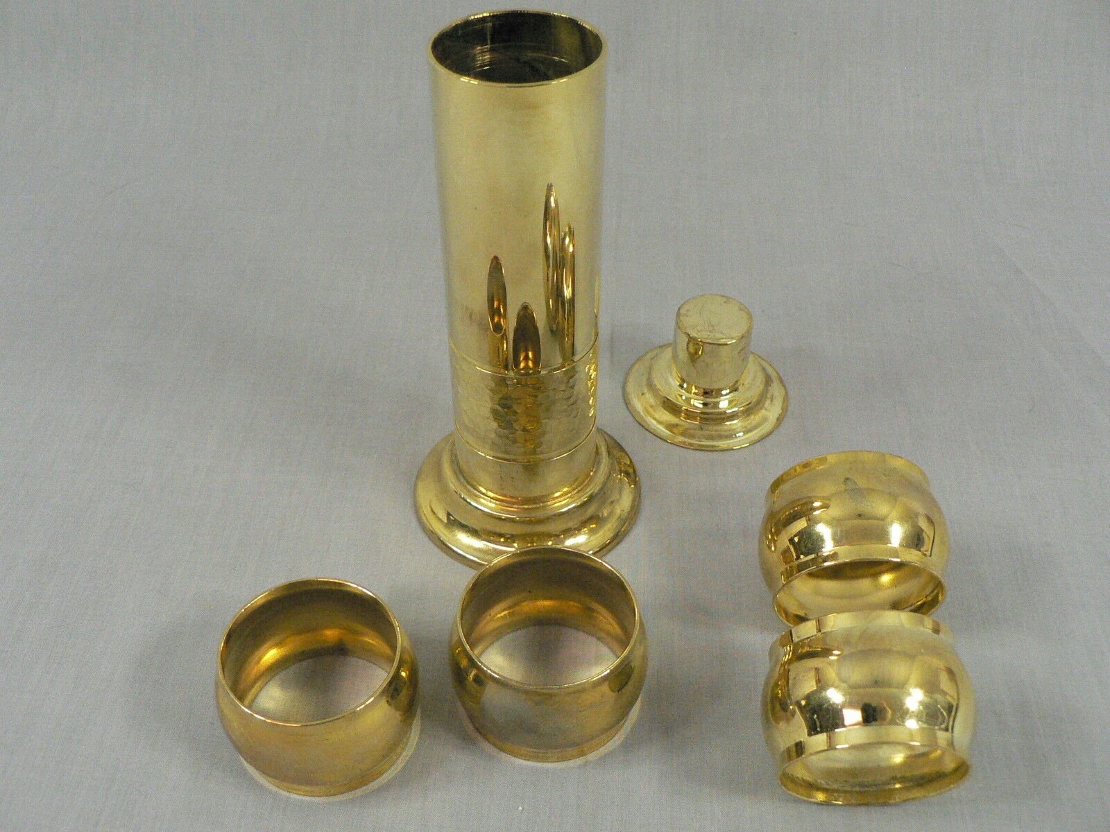 Napkin Rings, Stacked on Brass Candlestick Base 4 Rings and Stand